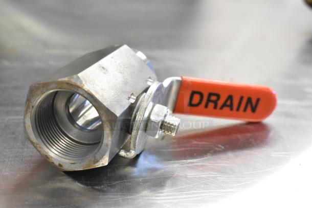 Metal valve with "DRAIN" lever, some rust visible. Ideal for plumbing or industrial use. Partially scratched, possibly model VR8204A2837.