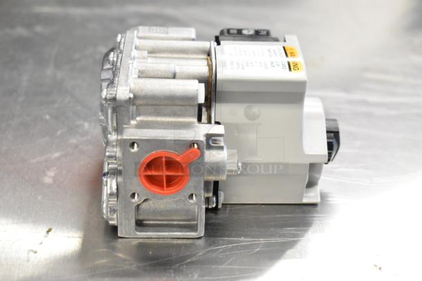 3 new VR8204A2837 gas valves, scratch and dent. Red and silver metal body, white label with warnings shown.