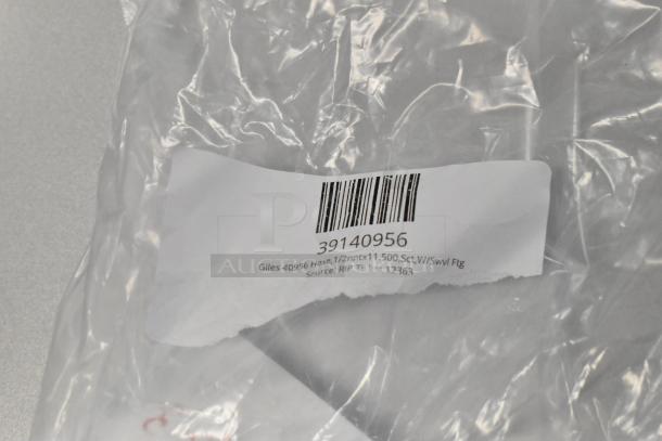 Plastic packaging with a label reading "39140956 Giles 40956 Hose, 1/2nptx11.500, Sct, W/Swvl Ftg."