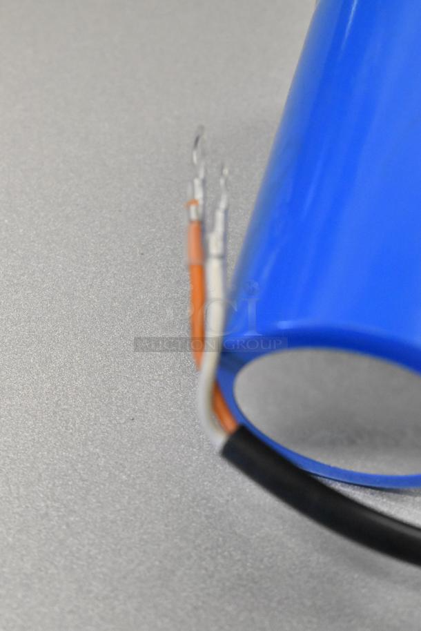 Blue Estella 348PSMRCAP56 running capacitor for SM40, 50, 60 mixers, brand new condition, with visible wiring.