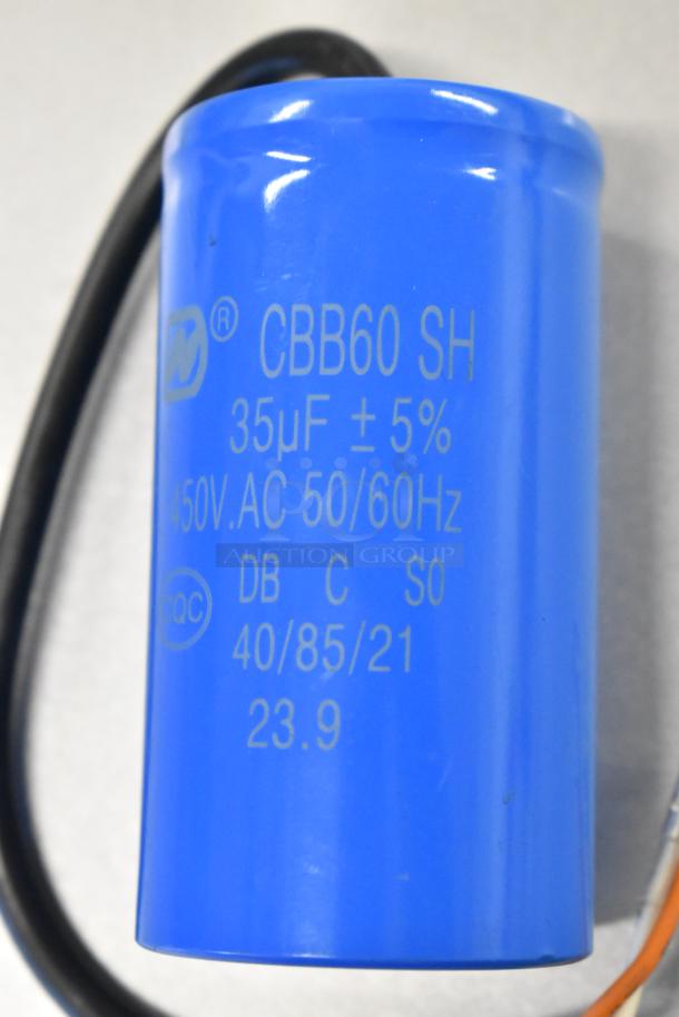 Blue CBB60 SH capacitor, 35μF ± 5%, 450V, AC 50/60Hz. New condition, visible markings with electrical specifications.