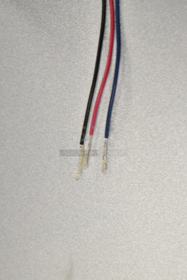 Black, red, and blue electrical wires with exposed ends against a light gray background.