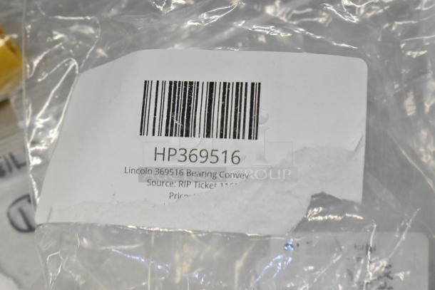 Lincoln 369516 Bearing Conveyor, new in package with barcode and label. Part of an 8-item auction lot.