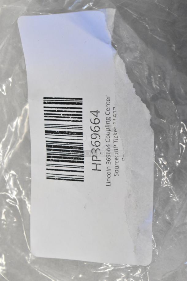 Lincoln 369664 Coupling Center, new condition, barcode visible on packaging, part of a scratch and dent auction lot.