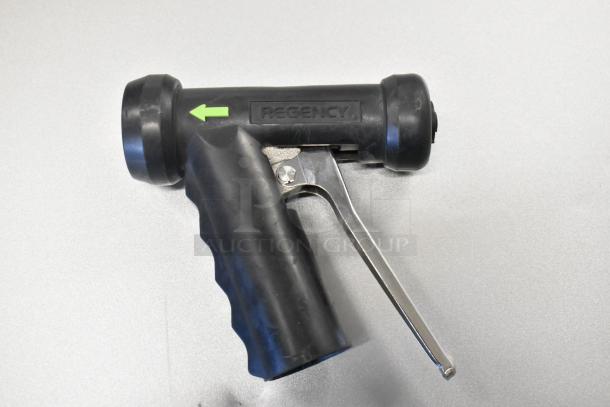 Rubber handle tool with "Regency" label, black, metal lever, used for kitchen applications, brand new condition.