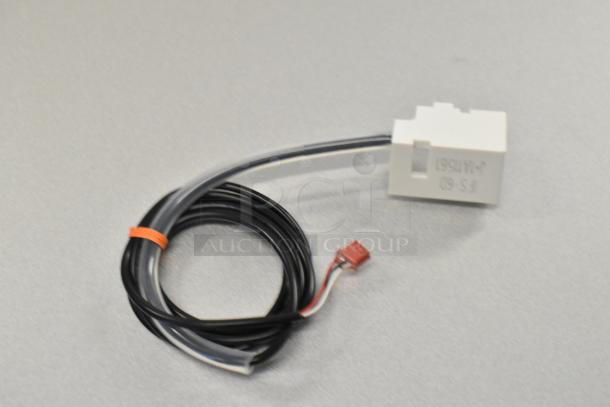 Avantco Ice sensor with black coiled wire, connector, and white casing marked "FS-60; 11178161"; new condition.