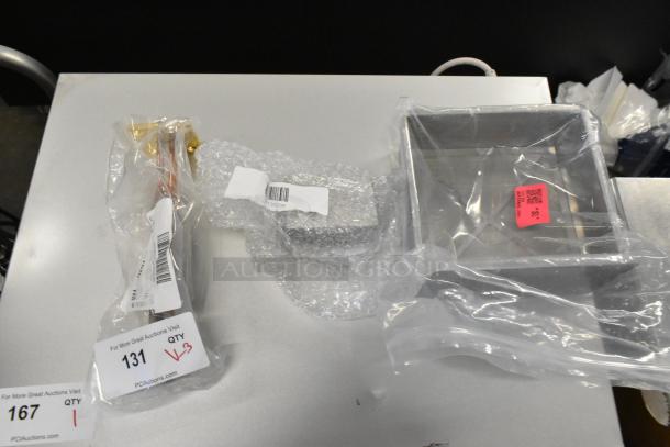 Three brand new kitchen items: Hatco R02.04.302.00 element, Giles 30206 drip cup, Shortening Shuttle SP-BS-100. Wrapped and labeled.