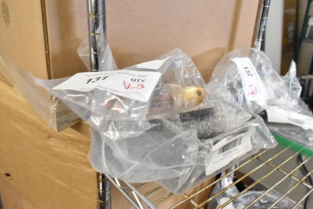 Three brand new items including Hatco Element 3000w, Giles Drip Cup Weld Assembly, and Shortening Shuttle Basket Strainer, packaged and labeled.
