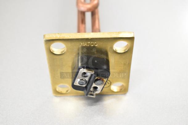Hatco R02.04.302.00 Element 3000w 208v, new condition, with visible gold plate and mounting holes.