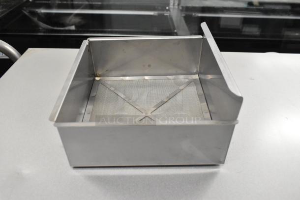 Shortening Shuttle® SP-BS-100 Basket Strainer, made of stainless steel, for oil filtration machines, shown unused.