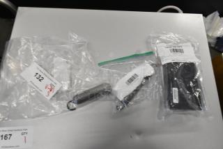 Three new scratch and dent parts: Garland oven door spring, ignition module kit, Southbend oven door spring in packaging.