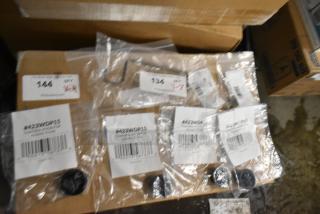 New scratch and dent auction items including ServIt control knobs, Southbend pilot tube, and Cleveland parts in sealed packaging.