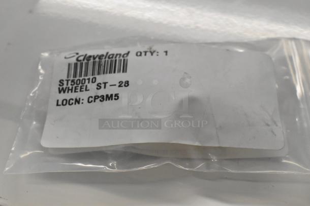 Cleveland ST50010 Wheel ST-28 in packaging, labeled with part number and location CP3M5. Brand new condition.
