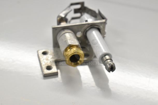 Scratch and dent Cleveland 105784 Pilot Assembly in new condition, featuring metal components and brass fittings.