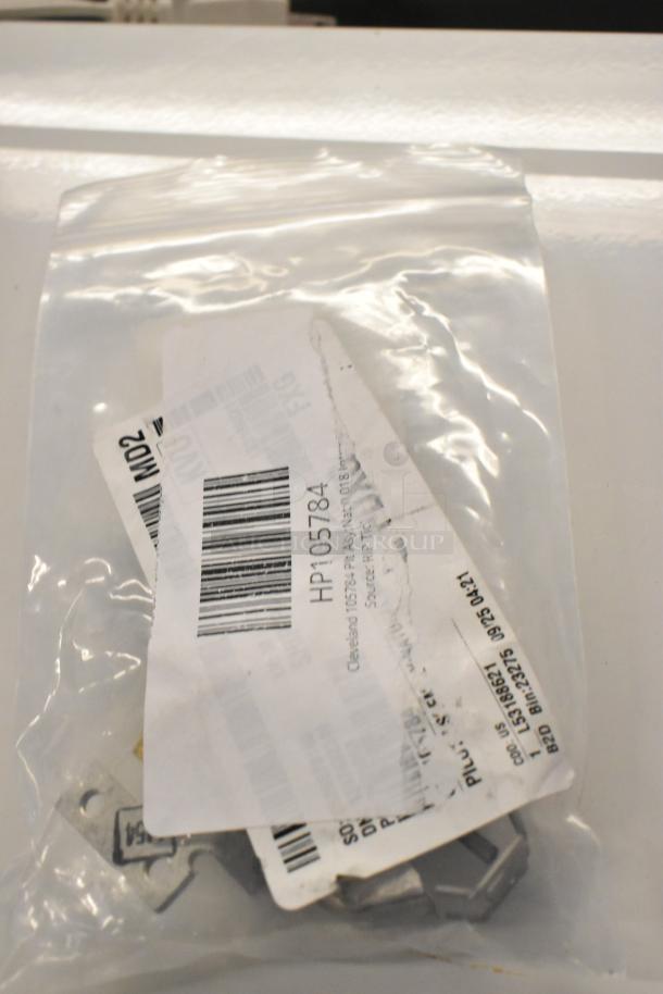 Bag containing Cleveland 105784 Plt Asy;Nat;0.018 Intermittent HP105784, new condition with label.