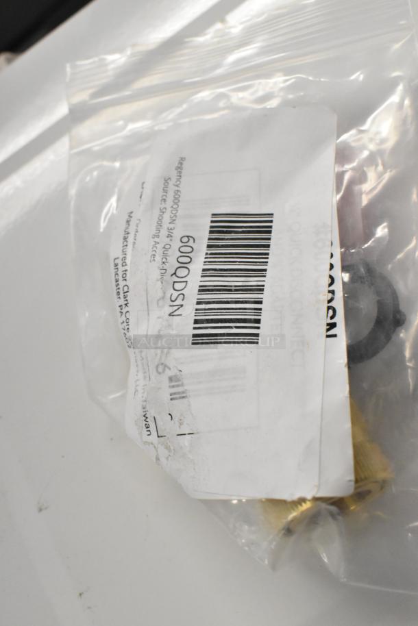 Brand new Regency 600QDSN 3/4" Quick-Disconnect Spray Nozzle Adapter in sealed packaging with visible label.