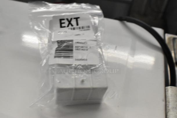 Plastic-wrapped relay with barcode and "EXT" label, part of a lot of six new scratch and dent items for auction.