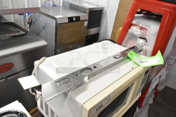 Eight new scratch and dent items including Imperial 37876 Burner Hanger and other kitchen components on display.