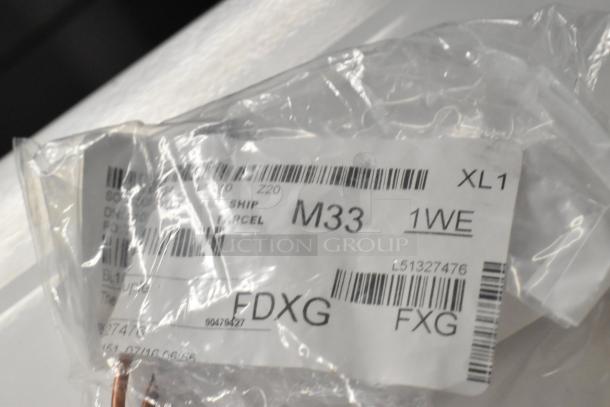 Eight brand new scratch and dent items in original packaging, various models, including Imperial Burner Hanger and Blodgett Thermocouple. Tags indicate shipping details.