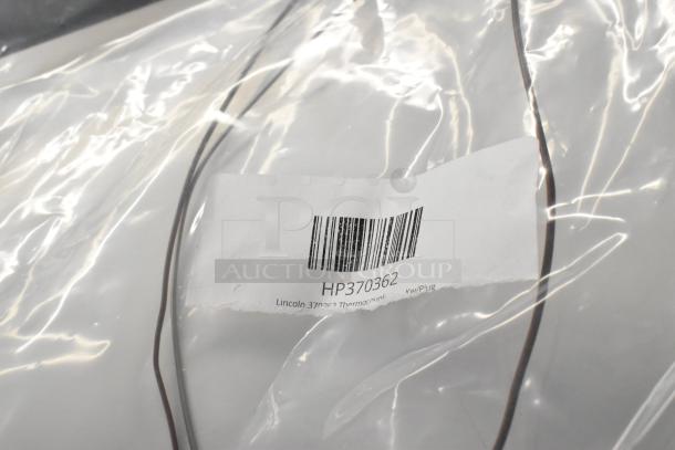 Lincoln 370362 Thermocouple with plug, new in packaging. Includes barcode and label with model number HP370362.