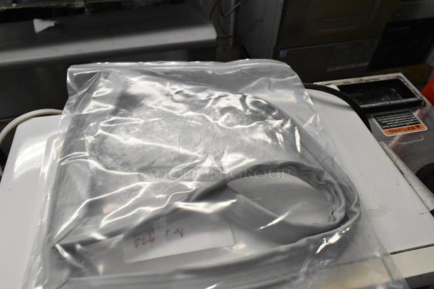 Sealed package containing brand new Moffat and Hoshizaki gaskets, with visible label in a scratch-resistant bag.