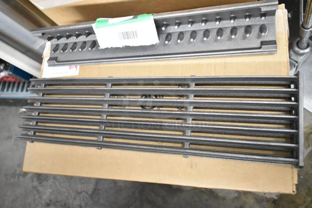 Three Southbend cast iron parts: a Cast Radiant HP1182755, Grate HP1182657, and Grate HP1178976. New with slight scratches.