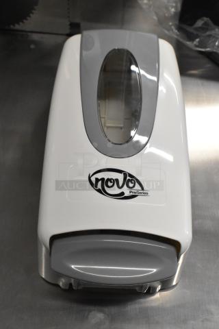 Brand new Novo White Manual Foam Hand Soap/Sanitizer Dispenser, 33.8 fl. oz., model 147NFMNDSPGY, visible logo.