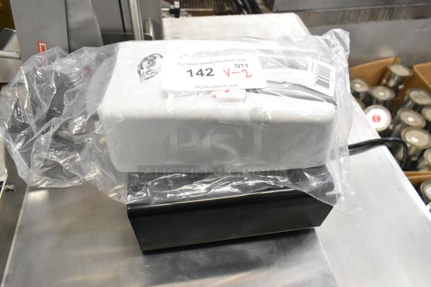 Brand new Novo White Manual Foam Hand Soap Dispenser and Choice Black Countertop Organizer in packaging, tags visible.