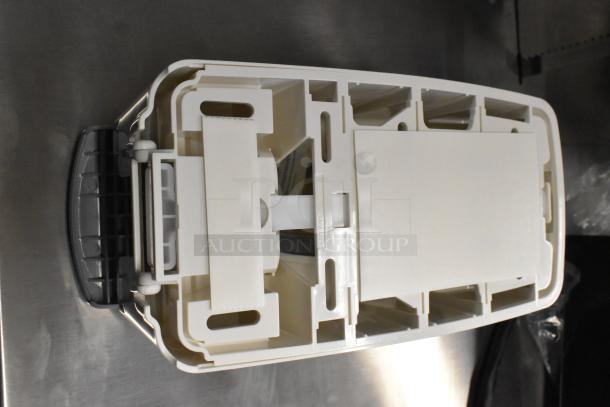 Novo White Manual Foam Hand Soap/Sanitizer Dispenser, 33.8 fl. oz., model 147NFMNDSPGY, shown with internal view.