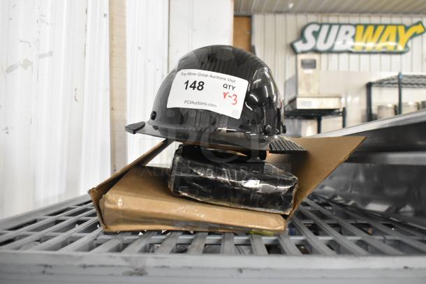 Brand new helmet, Cambro CFPFRC10135 nozzle pump, cutlery set; scratch and dent items with auction tag visible.