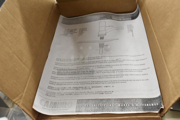 Brand new Cambro CFPFRC10135 ColdFest Nozzle Pump with cover in box; includes instruction sheet with assembly details.