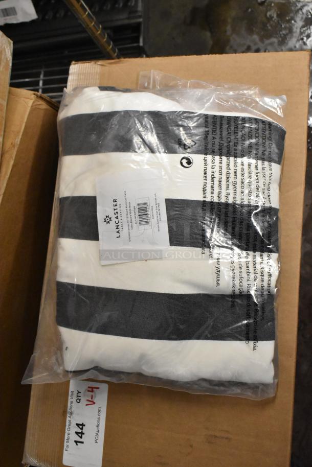 Brand new 427UMCAR75BW 7.5' black and white stripe umbrella canopy packaged, visible Lancaster label with product details.