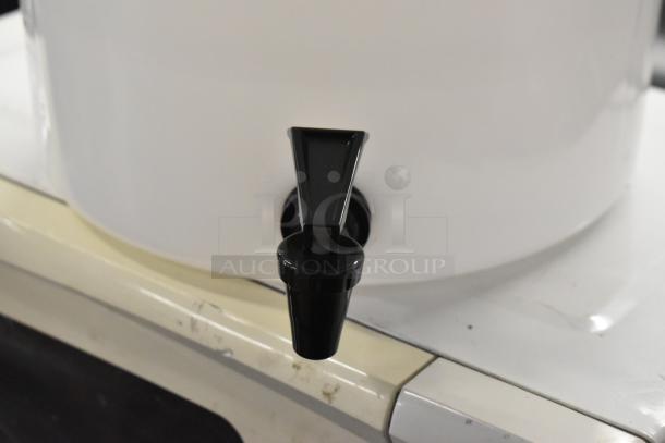 BRAND NEW SCRATCH AND DENT! Toddy® 975CMLTCM 5 Gallon Cold Brew System with Lift, black spout detail.