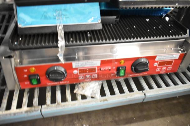 Brand new 2023 Avantco 177PG400T dual panini grill, grooved plates, timer, 19 5/8" x 9 1/8" surface, scratch and dent.