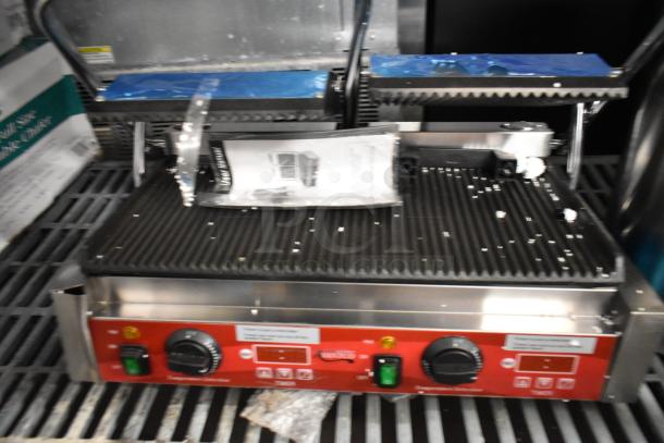 Brand new 2023 Avantco 177PG400T dual panini grill, grooved plates, 19 5/8" x 9 1/8" surface, 120V, with timer.