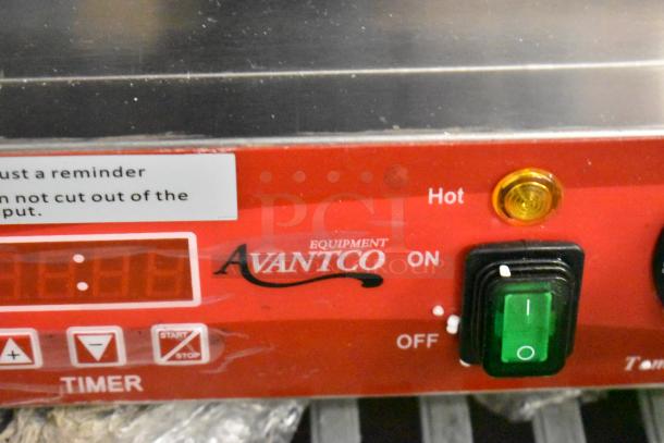 Brand new Avantco 177PG400T panini grill, grooved plates, timer, 19 5/8" x 9 1/8" surface, 120V, 1 Phase.