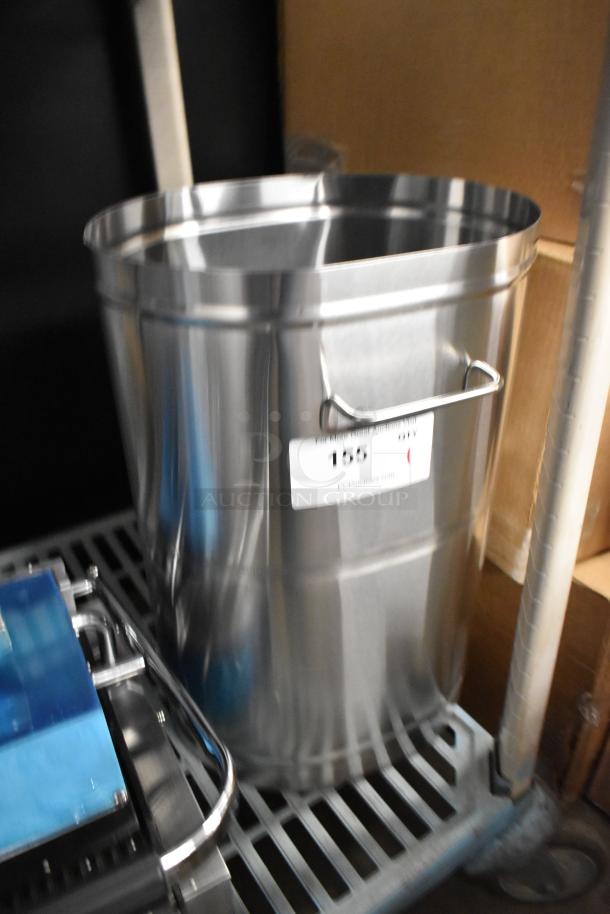 Brand new Bunn 34100.0002 TDO-4 iced tea dispenser, 4-gallon capacity, brew-through lid, minor scratches, metal construction.