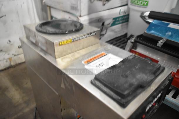 Bunn VP17-2 stainless steel coffee machine, 2 burner, commercial countertop, 120 volts, 1 phase, caution and warning labels visible.