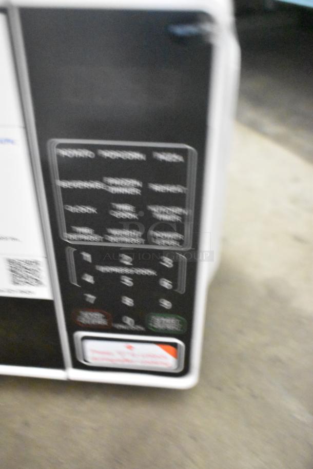 Two 2025 MS8436127995-03 countertop microwaves with digital keypad, 120 volts, 1 phase. Includes plates.