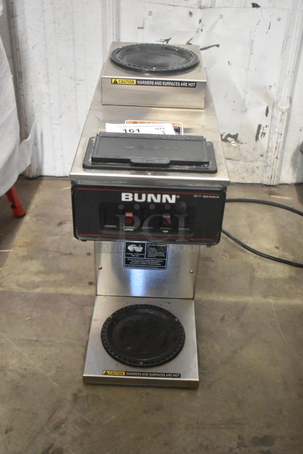 Bunn VP17 Stainless Steel Commercial Coffee Machine, 2 Burners, 120V, with caution labels, in used condition.