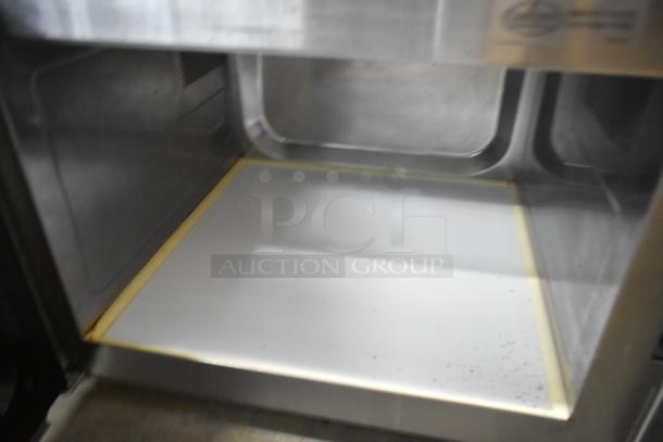 2021 Amana RCS10TS stainless steel commercial microwave interior, clean condition, 120 volts, 1 phase.