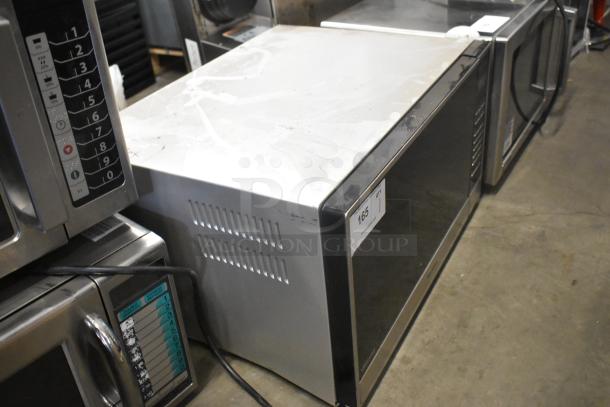 2023 Panasonic NN-SN975S stainless steel countertop microwave oven, 120V, 1 phase, slight surface wear.