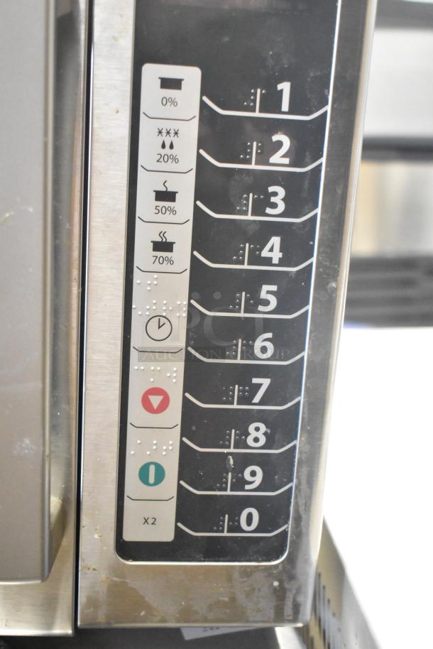 2021 Amana RCS10TS stainless steel commercial microwave, keypad controls, 120 volts, 1 phase, visible control panel.