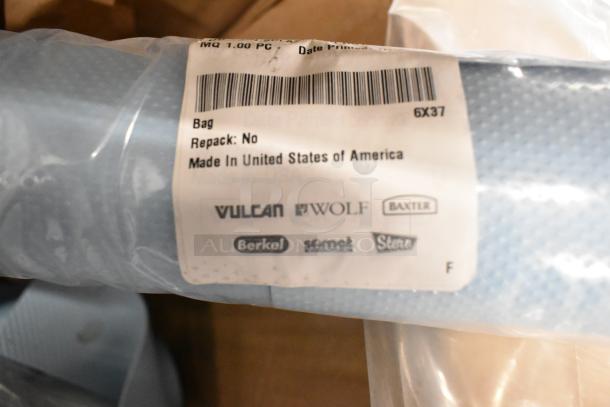 "Brand new scratch and dent Vulcan unit with visible label; Made in USA. Includes brand logos: Vulcan, Wolf, Baxter."