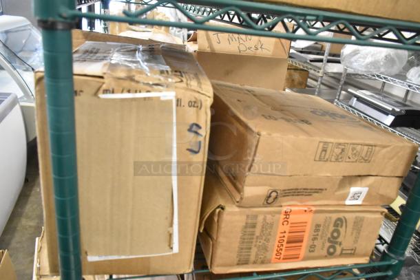 Seven new items in slightly damaged boxes, including Foresight saliva kit and Gojo handwash. Tags show wear.