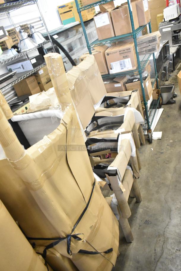 Brand new black wood pattern bar height chairs with black seat cushions, partially boxed, scratch and dent condition. Quantity: 40.