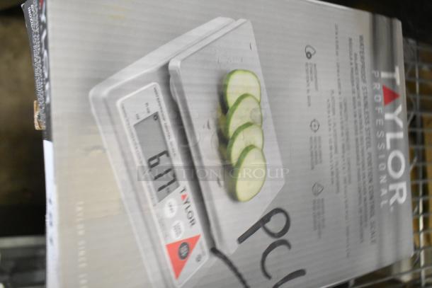 Brand new Taylor TE10CSW 10 lb. waterproof digital portion control scale box, marked for scratch and dent sale.