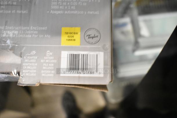 BRAND NEW Taylor TE10CSW 10 lb. Waterproof Digital Scale, portion control for dry/liquid measuring. Box partially visible.