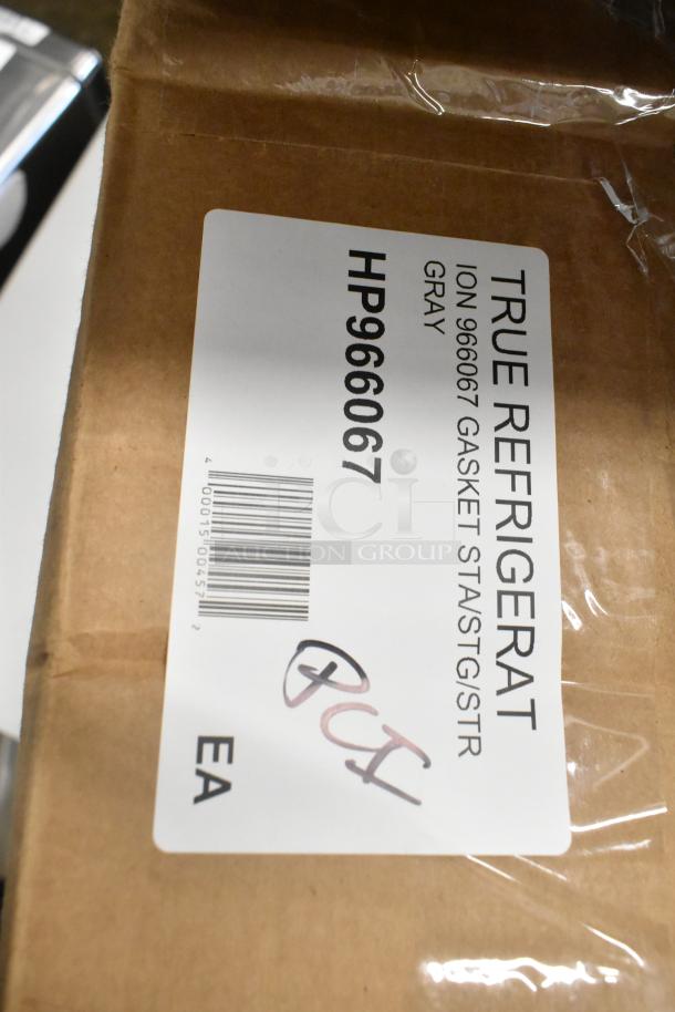 Brand new HP966067 True Refrigeration gasket in gray with minor scratches. Box labeled with product details and barcode.