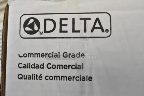 Box of Delta Faucet 590-PALGHDF, commercial grade, touchless with 0.5 GPM aerator, scratch and dent condition.